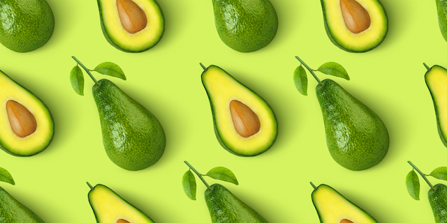 avocado seamless pattern isolated on green background