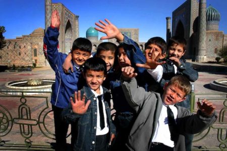Young_Uzbekistani_boys_at_a_mosque_in_Uzbekistan
