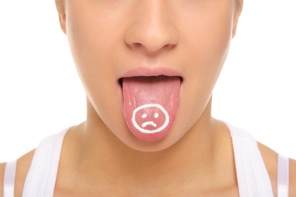women's tongue with sour face painted i